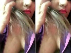 Watch a stunning model flaunts her ample cleavage