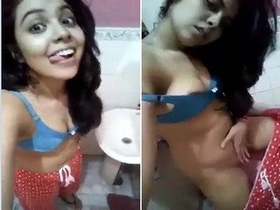 Pretty girl shows off her body in a video