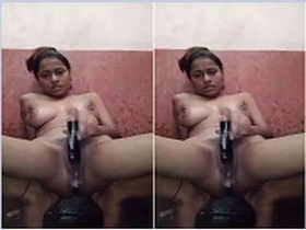 Black girl masturbates with a bottle in a steamy video