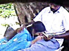 Tamil uncle and Asian girl enjoy park-side suckling in steamy video