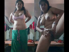 Beautiful woman with large breasts captures herself in a selfie