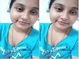 Busty Indian babe enjoys playing with her big boobs and masturbating