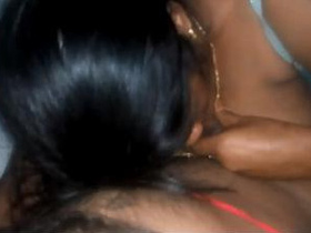 Indian aunty gives a steamy blowjob in bed