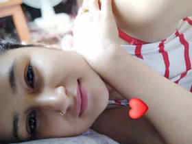 Petite Indian girl with unshaved vagina uses fingers to pleasure herself
