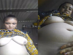Curvy auntie flaunts her big boobs and pussy in front of the camera