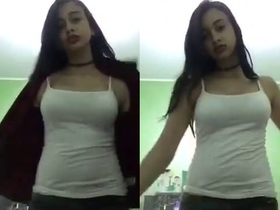 Adorable young girl with big breasts and shaved pussy on display