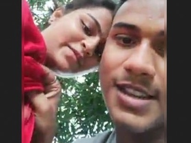 Desi couple's romantic outdoor escapade in a village setting