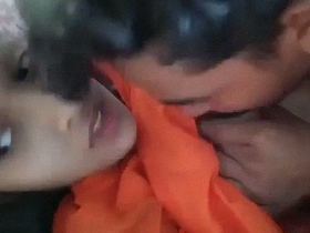 Indian teenage lovers enjoy steamy sex on the couch with titjob