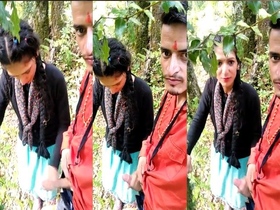 Indian couple enjoys outdoor handjob on a blanket
