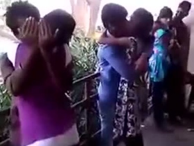 College students share a passionate kiss at the top of the mountain