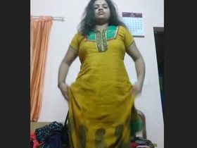 Get a glimpse of a sexy woman in a striped trouser suit