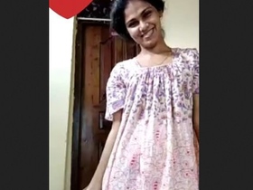 Beautiful girl flaunts her breasts and vagina