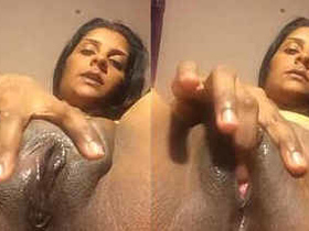 Horny aunty masturbates with loud moans and fingers her wet pussy