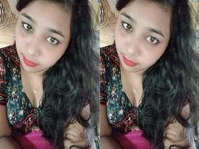 A stunning girl flaunts her assets in a seductive video