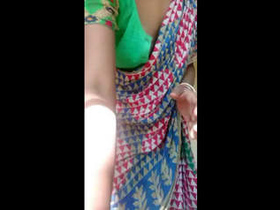 Indian auntie strips naked and teases in front of the camera