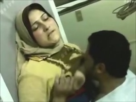 Hijab-clad Arab babe in a steamy sex scene