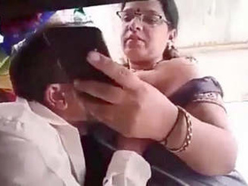 Tailor gives a blowjob to auntie's big boobs