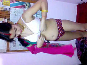 Indian bhabi in lingerie gets filmed changing her underwear