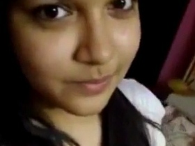 Indian girl with fake boobs takes nude selfie and teases in solo video
