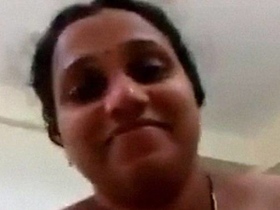 Indian aunt shy rides on Lunda's video camera in homemade sex tape
