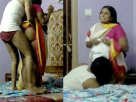 Aunty with big butts gets fucked by young guy in steamy video