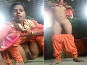 Rustic beauty bares her body in solo video