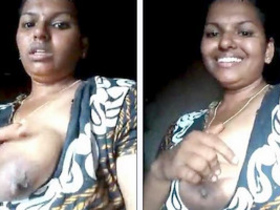 Auntie's big boobs on display for neighbors to see