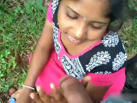 A seductive woman gives a POV blowjob in the open air