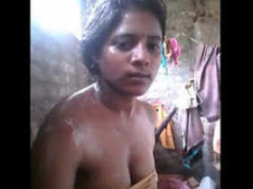 Tamil babe soaps up in the shower