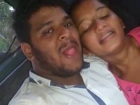 Young couple enjoys passionate sex in car