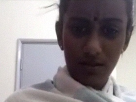 Watch a stunning Indian girl strip down to her sexy boobs