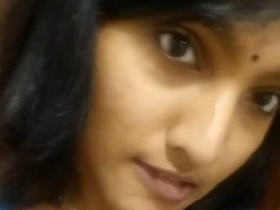 A Tamil girl bares her breasts in a nude video