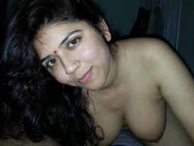 Teen beauty shows off her body in a car