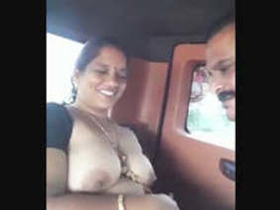 Desi bhabhi giving a titjob to her partner