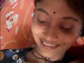 Watch a hot Indian teen strip down and show off her body in this solo video