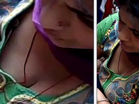 Aunty's ample bosom on full display from above