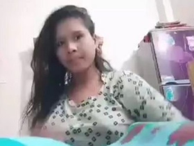 Young girl flaunts her seductive curves and pleasures herself