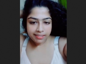 Indian babe flaunts her big boobs and pussy in a seductive video
