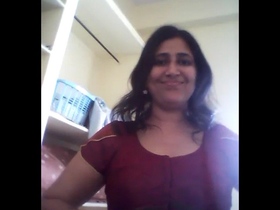 Chubby Indian aunt flaunts her big tits and pussy in a seductive striptease