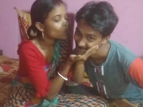 Indian couple in sarees enjoys steamy sex in a bedroom