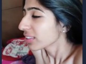 Indian wife giving a blowjob to a huge penis