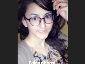 Pakistani girl in a bikini bathing in the pool