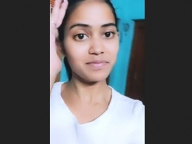 Cute Bengali girl flaunts her sexy curves in a solo video