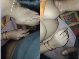 Exclusive video of a rustic wife giving a titjob in the village