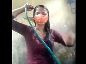 Teen in a bikini takes a bath in the village