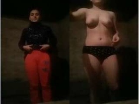 Exclusive cute desi girl strips down to her panties and teases with her boobs