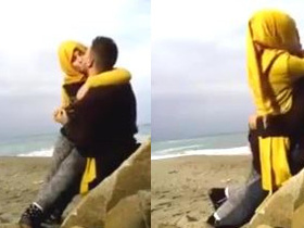 Muslim women kiss in a pornographic video