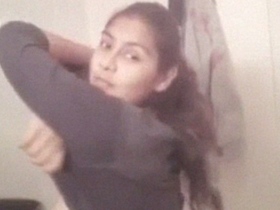 Naked Indian girl strips and teases in the bathroom