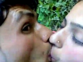 Desi couple enjoys outdoor sex on a bed in the garden