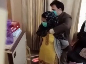 Pakistani doctor performs breast examination by inserting his hands inside blouse